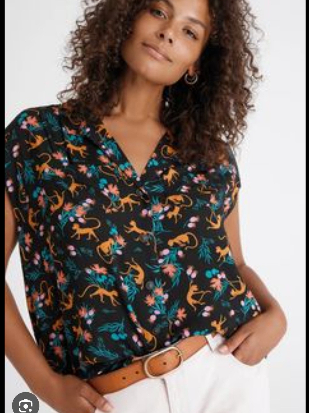 Anthropologie Black V-Neck Short Sleeve Top with Orange & Teal Print